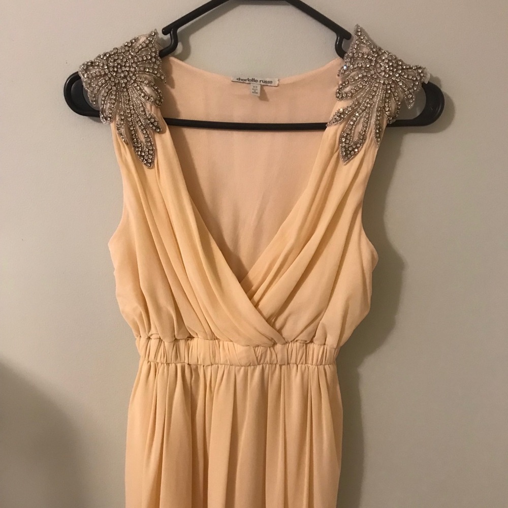 Flowy Ivory Dress with Shoulder Embellishment